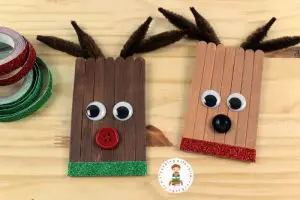 Learn how to make cute DIY Reindeer ornaments from craft sticks! These are easy enough for kids to make. They look great on the tree, and make perfect kid-made gifts. 